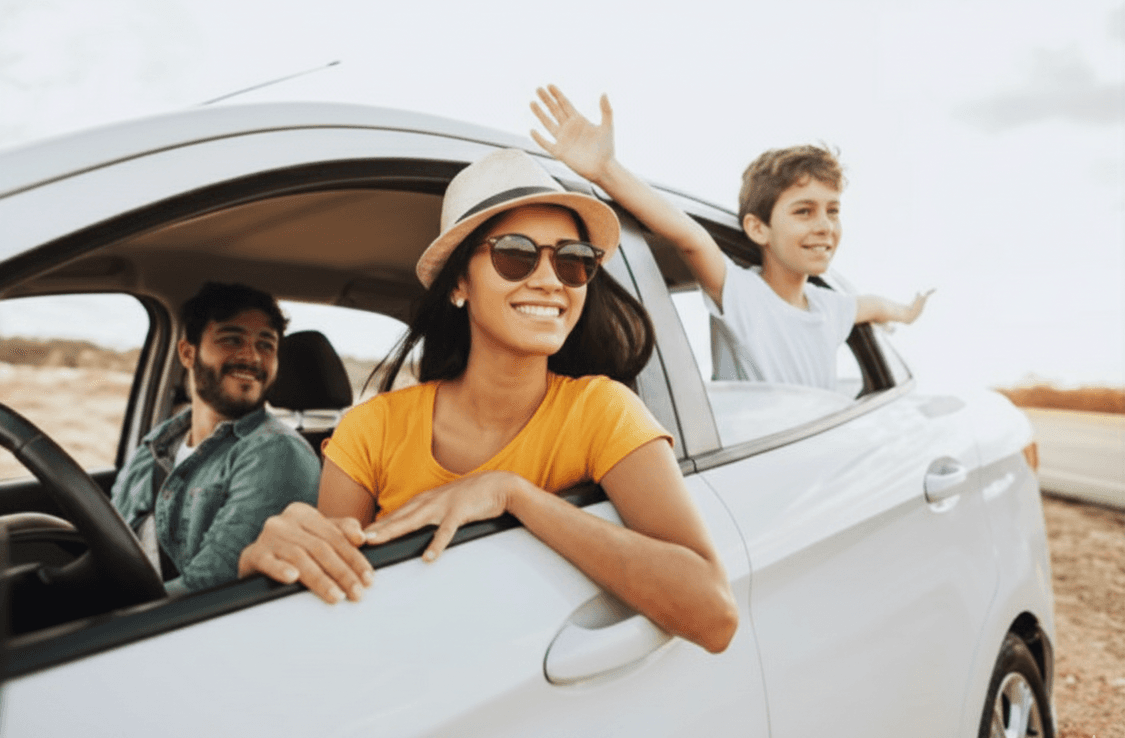 Happy family in clean taxi