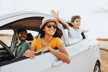 Happy family in clean taxi